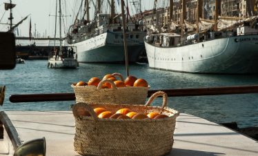 The little harbour at Sete and oranges
