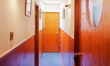 Corridor on board luxury French barge hotel