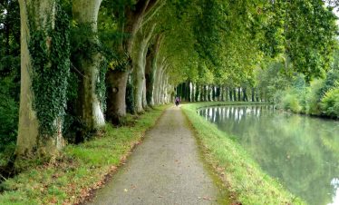 Cycle along the canal towpath in Gascony France