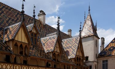 Ornate roof top of Hospices de Beaune Burgundy