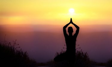 Peaceful yoga at sunset