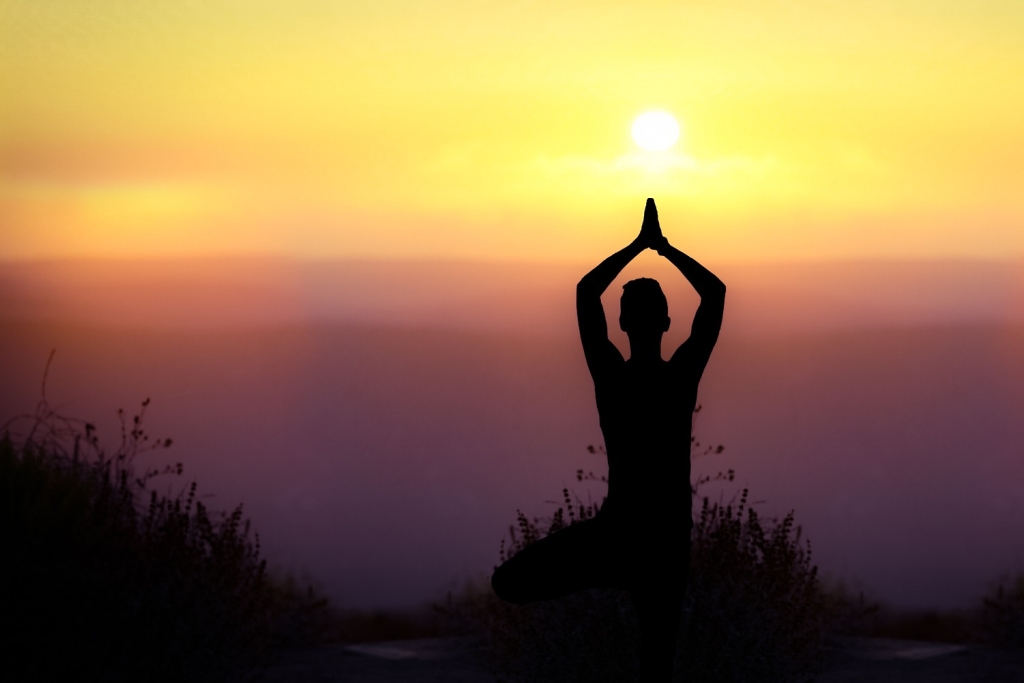 Peaceful yoga at sunset
