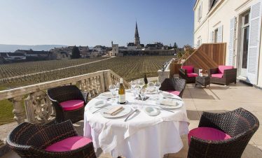 Dining on the terrace overlooking the vineyard