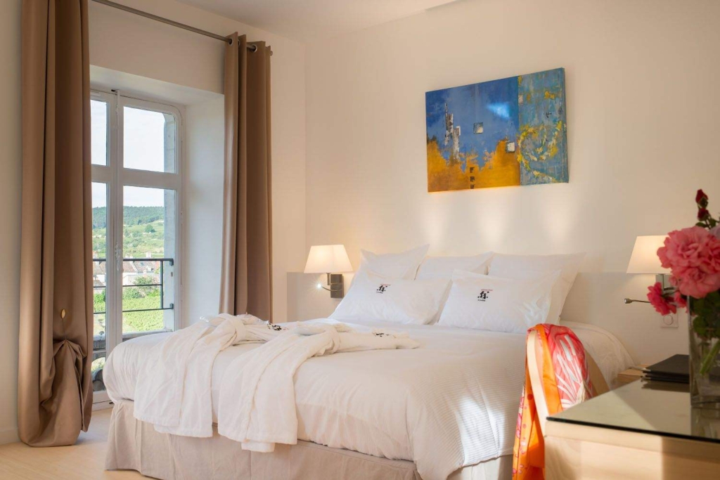 Superior room in chateau spa hotel in Meursault