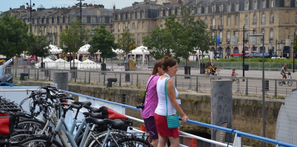 Cruise boat leaving Bordeaux with bikes on board